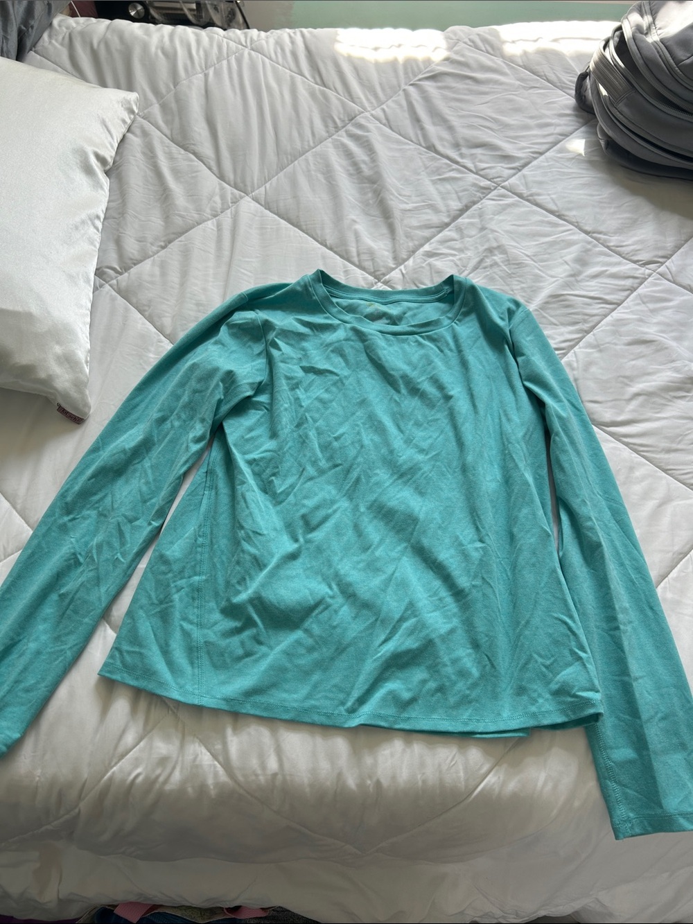 Turquoise athletic shirt